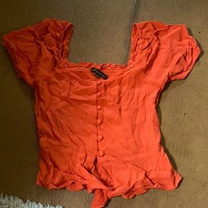 Coral over the shoulder top